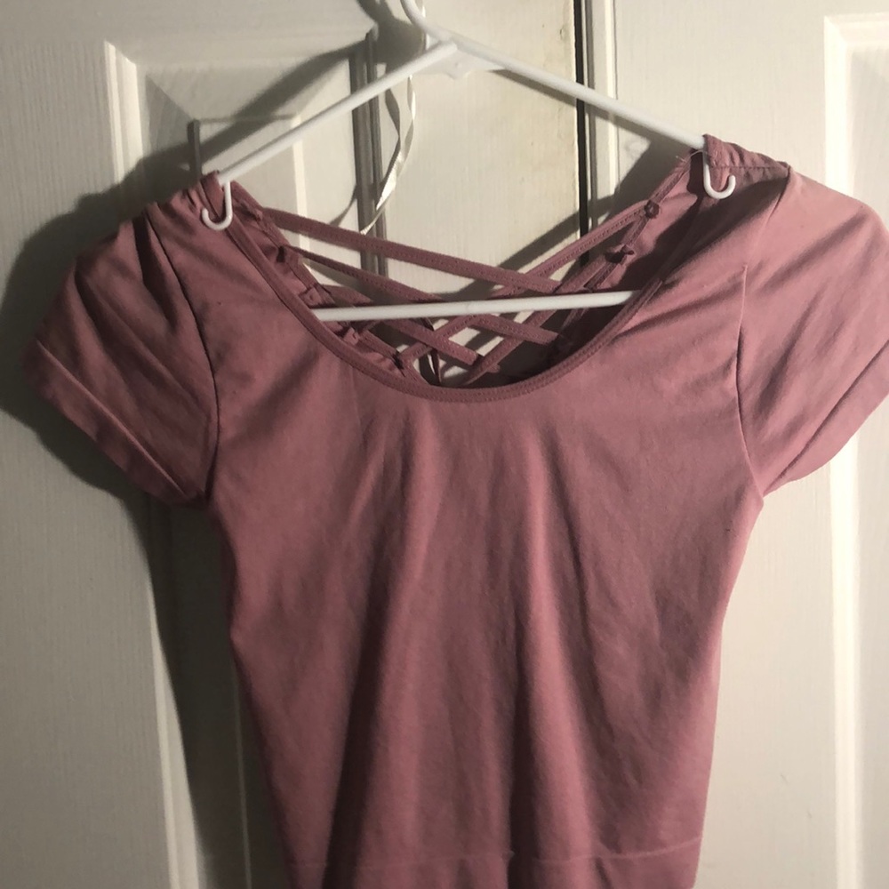pink crop top with crosses in the back
